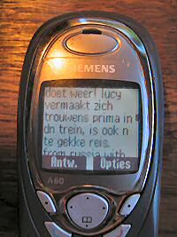 Picture of my phone displaying a sms