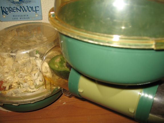 Serving my hamster Lucy the Ceasar Salad dish I made for her.