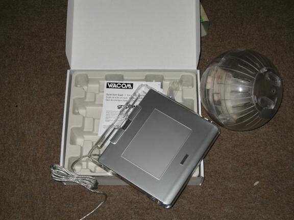Unpacking the Wacom Graphic tablet.