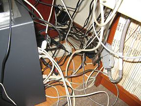 Picture cables hooked up to the computer.