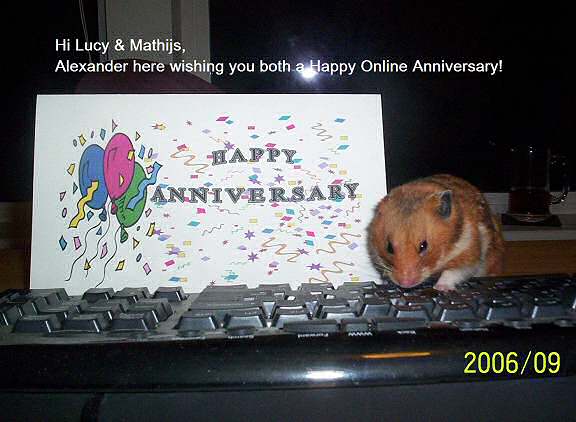 Photo if Virginia's hamster Alexander, congratulating HamsterTracker.com.